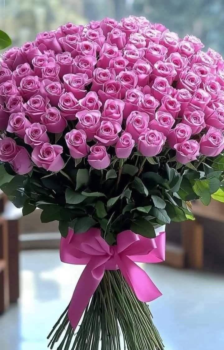 Professional floral arrangement in modern corporate setting